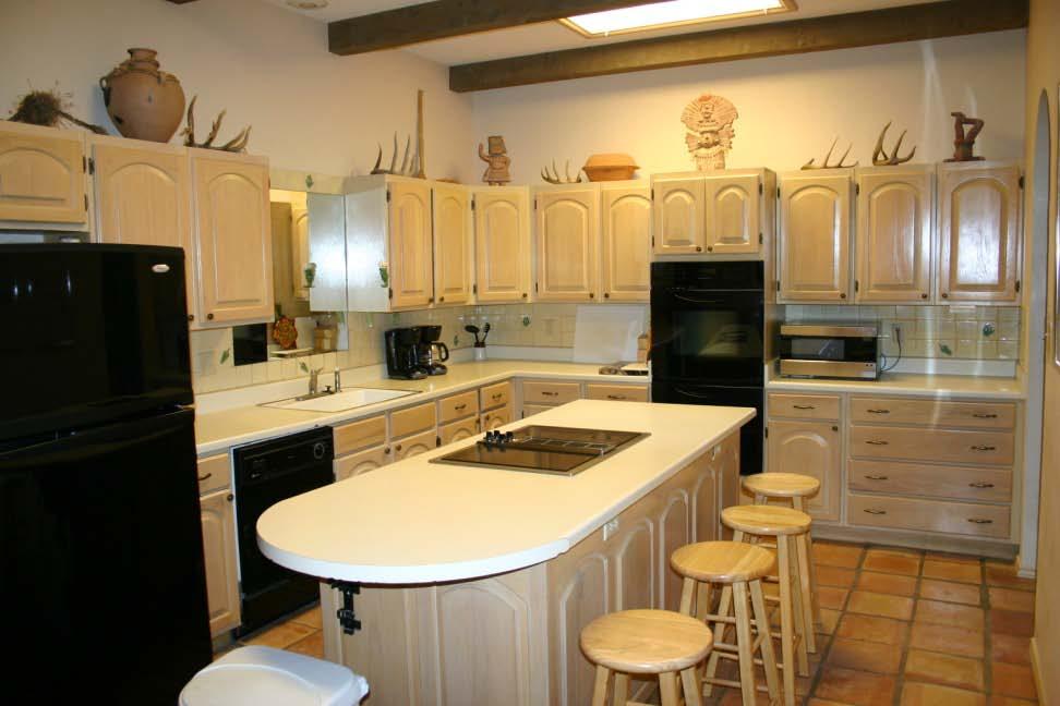 The kitchen is appointed with oak