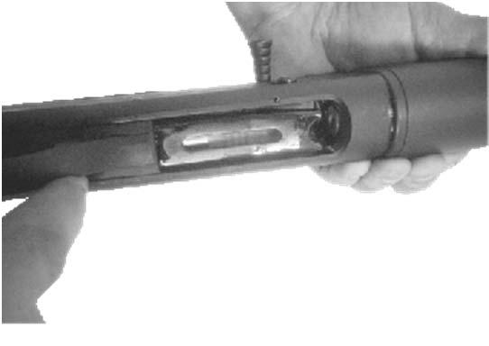 9). Load shells into the magazine by inserting them through the loading port