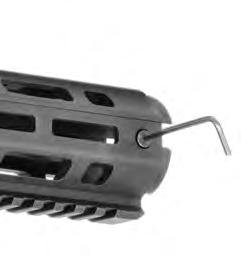 second person can pull the halves of the handguard free - tipping them out at the bottom first and then down out of the handguard cap at top (FIGURE 80).