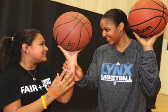 Lynx Give Back Lynx 2011 draft pick, Amber Harris, gives basketball