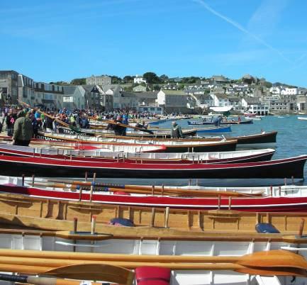 Left: Colourful pilot gigs line the shore at the Pilot Gig Rowing World Championships, held annually on the Isles of Scilly.