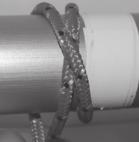 complete the clove hitch. 2. Lead the tail of the halyard over the fall 3. Where the tail crosses over the fall 4.