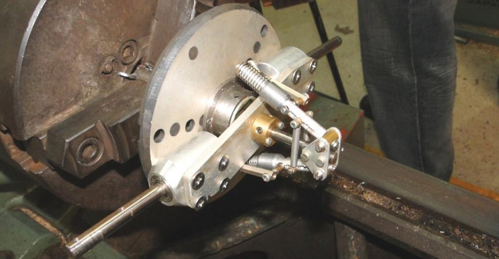 Masses fitted onto the governor. The system is set in lathe ready for testing Fig. 5.