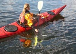 This should turn the canoe in stationary position. You can also turn a canoe that has speed by braking with the paddle, the canoe will turn to the paddle side.