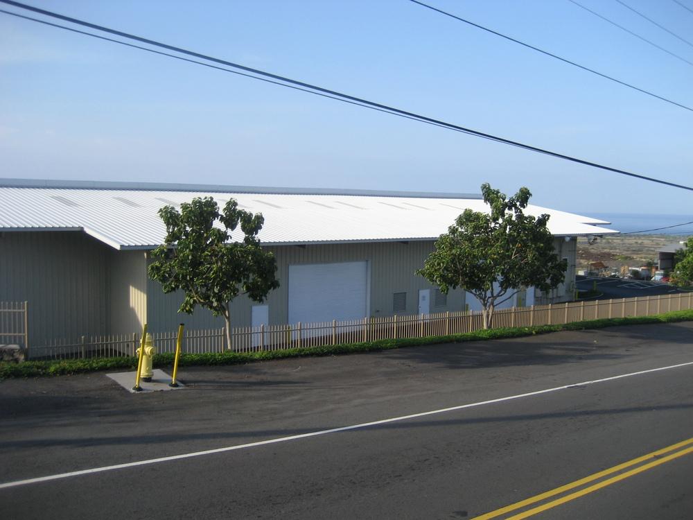 Property Description PROPERTY OVERVIEWVIEW The Hansen Warehouse is a fully sprinklered metal building with high bay doors, security gate, fence and glass railing surround on a beautifully landscaped