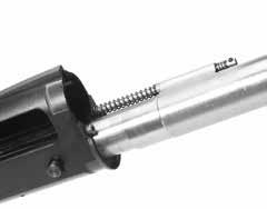 Slide the piston tube up to meet the gas bracket so that the piston tube goes up into the gas bracket. The barrel extension should slip solidly down into the receiver.