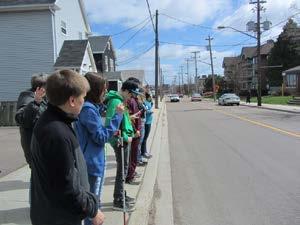 May 2013 Workshop Figure 9 Students lined up side-by-side along the curb.