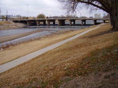 A small corridor park exists between South Palisade Street and the River. As with the 21st street dam, this location presents a major safety hazard, due to the dangers associated with the dam.