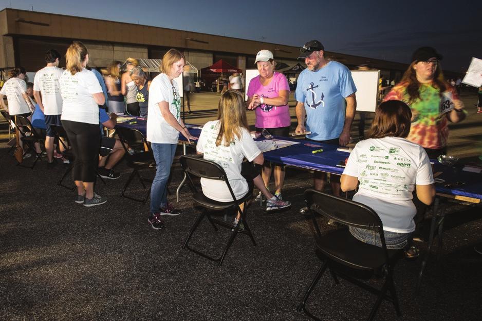 ALL volunteers must check-in at the Volunteer Sign-in table upon arrival! CHECK-IN TABLE Arrival time: 5:30 a.m. 1.