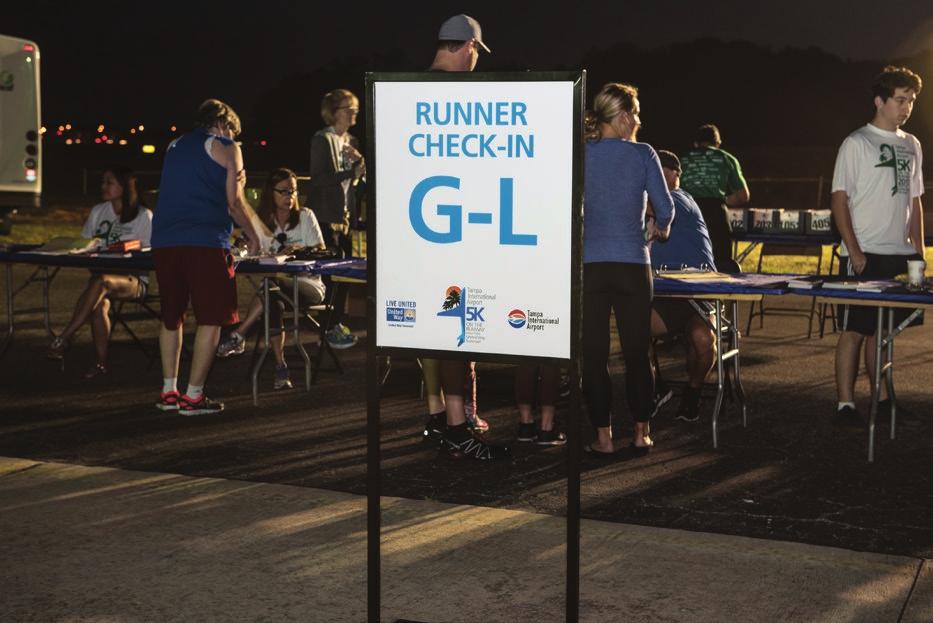 Listen for check-in table volunteer to call out bib # & shirt size. 2. Place in bag. 3. Hand to runner. 4.