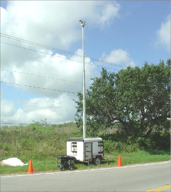 downstream. Digital video recording equipment was used to create a permanent 24-hour site visit video for passing lane beginning and ending points for each of the four passing lanes studied.