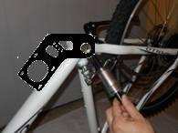 Page 7 of 39 9) Get the longer part of the cartridge bottom bracket and go on the right hand CHAIN side of the bike; place it into the bottom bracket on the