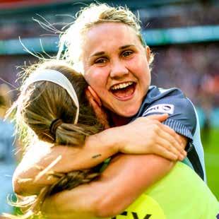 Izzy Christiansen celebrates winning the FA Cup Steph Houghton and the team lift the FA Women s Super League trophy In September 2016 City became FA WSL champions for the first time in their history