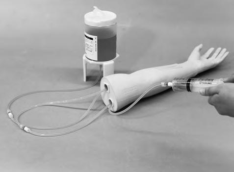 Preparation Connection of the tube Fill the simulated blood Connection of the tube 4. Connect a syringe (50mL) to the connector of the tube that comes from the median antebrachial vein injection pad.