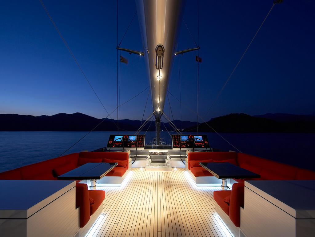 This is a place for leisure and dining as well as the main control centre from which the captain drives the yacht under sail. Open the transom and a vast platform unfolds.