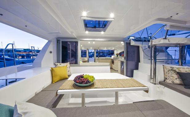 The modern galley boasts corian countertops, a stainless steel sink with single lever mixer faucet with