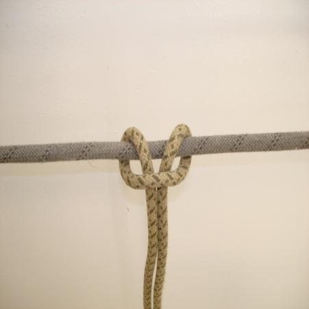 (12) MIDDLE OF THE ROPE PRUSIK. (a) Purpose: To attach a moveable rope to a fixed rope. Place a bight of rope over the fixed rope. The closed end of the bight is 4 to 6 inches below the fixed rope.