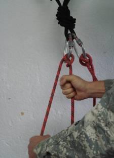 This can be done either using a Munter hitch or using an autolocking style belay device in autolocking mode. In either case, the first step is to attach yourself to the anchor and shout Off Belay!