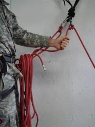 seconds tie-in strand when he reaches the anchor. Another option is to stack the rope back and forth over a leg or foot.