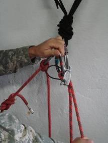 This often requires a larger stock carabiner and can only lower inches at a time; however works well if only a short lower is required.