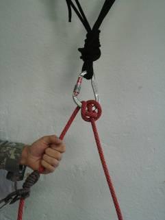 Ensure the point of redirection is far enough behind the belay device to provide