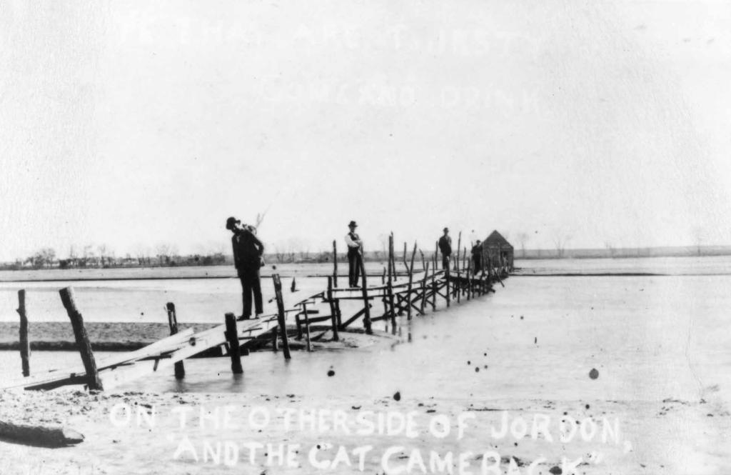 Bridge leading to the Sand Bar Saloon on the South Canadian River in the 1890s. Chief Quanah Parker maintained a comfortable herd of about 500 head.