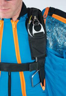 Innie-Outie zip system: For BASE mode, you have the option of zipping the front of your harness system inside the suit: place the shoulders of your harness inside the front of the suit as shown.