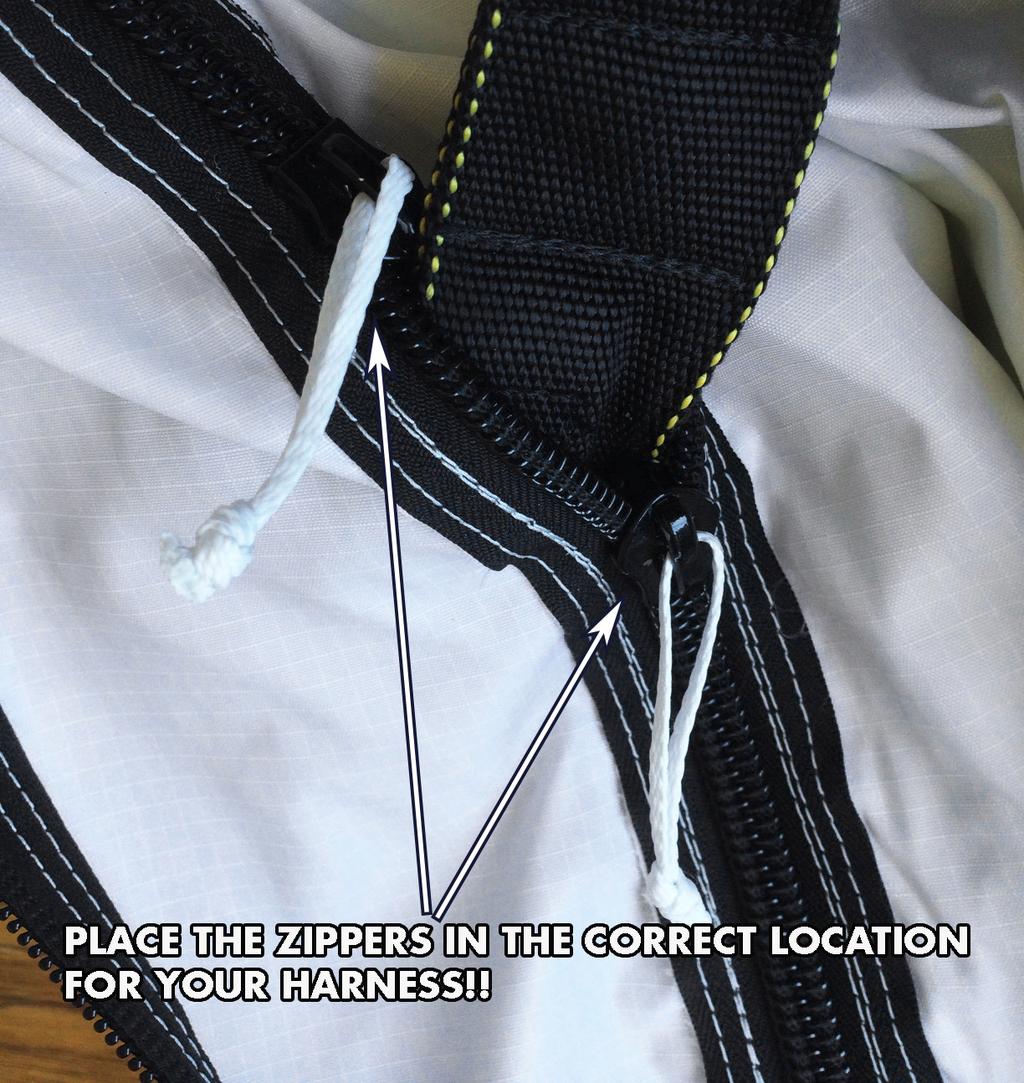 The standard Innie-Outie Zip system travels up and down the zipper naturally with suit movement. This spectra loop modification prevents the sliders from moving naturally while you wear your rig.