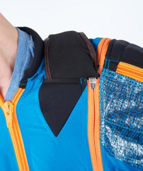 Innie-Outie zip system: For BASE mode, you have the option of zipping the front of your harness system inside the suit: place the shoulders of your harness inside the front of the suit as shown.