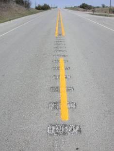 Centerline rumble strips (CRSs) alert drivers inadvertently crossing into opposing traffic to reduce head-on crashes, opposite