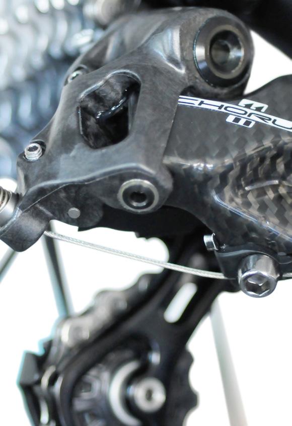 2 - REAR DERAILLEUR ASSEMLY AND ADJUSTMENT Secure the rear derailleur to the frame using screw (A - Fig.