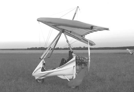 WE HOPE THAT YOUR ULTRALIGHT WILL PROVIDE YOU WITH MANY HOURS OF SAFE AND ENJOYABLE FLYING. 1.3 Two View Photos 1.4 General Dimensions DIMENSIONS METRIC IMPERIAL Wing span 10.0 m 32.8 ft Wing area 14.