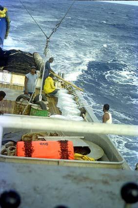 Figure 8. An NFD anchored FAD being set off the Solomon Islands with rope and anchors being set after the FAD float has been released (photos D. Brogan) 2.