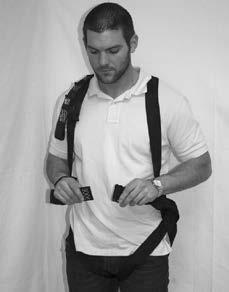 (Figure 7) STEP 8: Pull the strap tight forming a waist belt and insert the strap