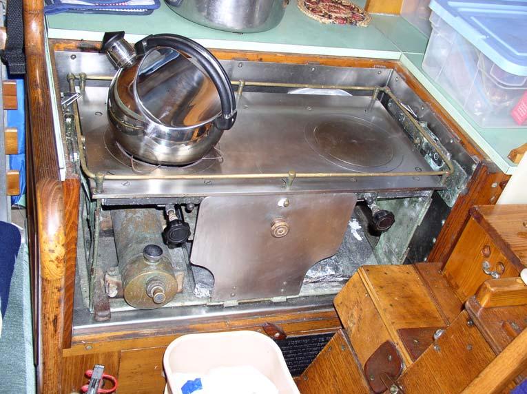 The gimbaled alcohol stove is mounted on the starboard side of