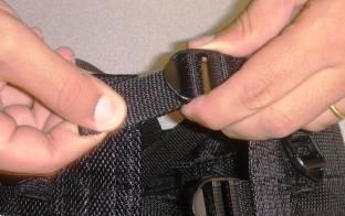 Tighten all of the buckles as tight as you can with your hands. You will find that when you sit on the seat, the mesh will loosen a bit and buckles will slip or the mesh will shift a bit.