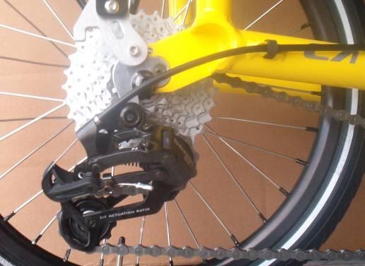 Protect your work surface and keep paper towels handy. It's easy to thread the chain through the rear derailleur cage incorrectly.