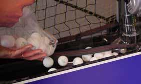 7 Pour in the Balls Make sure that you use only recommended balls for the Newgy Robo-Pong 3050XL Newgy Robo-Ball 2-Star 40+mm, or any ITTF-approved 2 or 3 star 40+mm balls.
