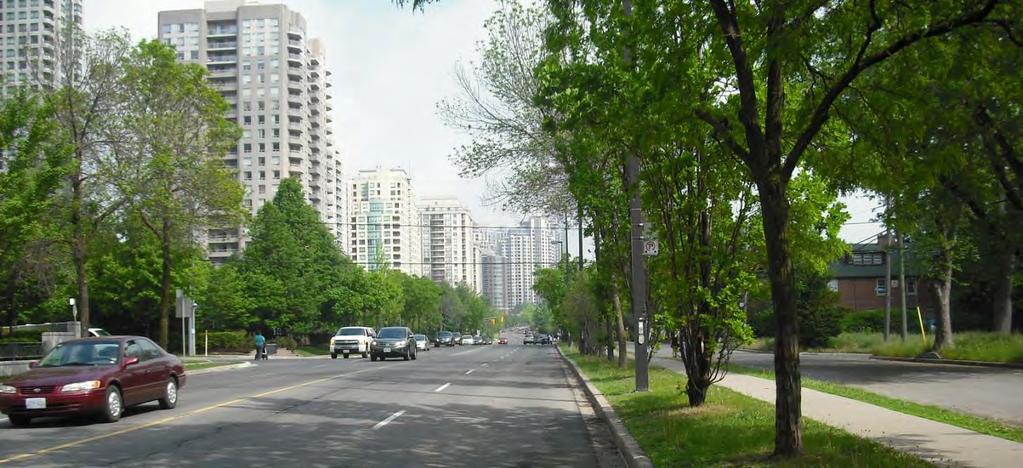 This area is envisioned to be a vibrant urban environment that balances the transportation needs of all users, Existing conditions on Beecroft Road near Park Home Avenue, looking south.