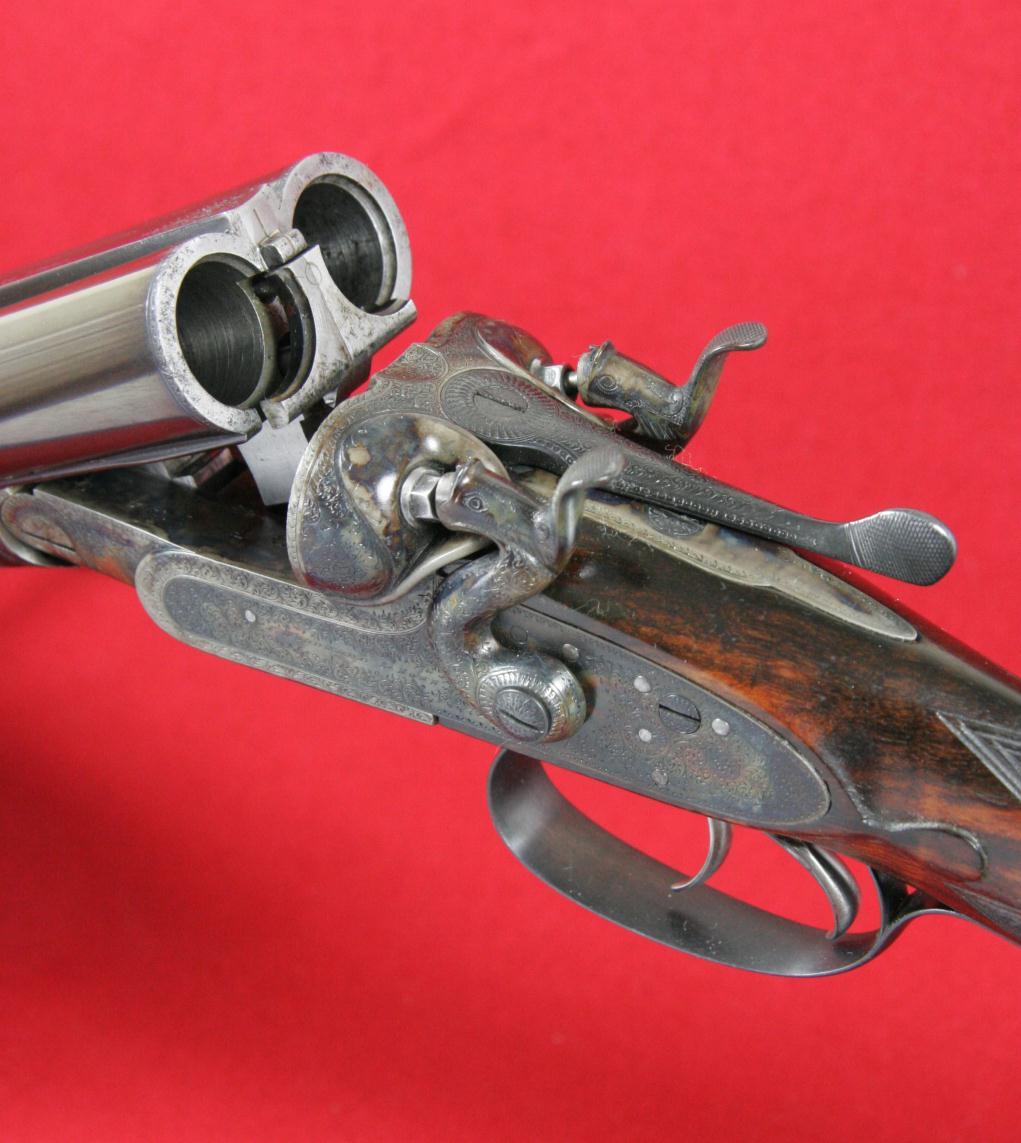 The next example for review is a bar action 12-bore hammer ejector gun, serial No. 4,149.