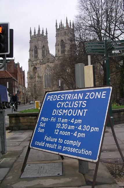 This then allows regular journeys to school and work to take direct routes to, and through the centre. York, crowded for much of the time, allows cyclists through the centre outside core hours.