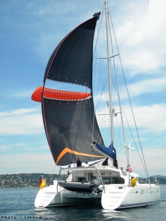 THE QUALITY A fabric with aeronautic standars, like a paragliding's wind with girth hitchrope line knot, a symmetric spinnaker provided with an air intake to canalise the flow, a perfect design, the