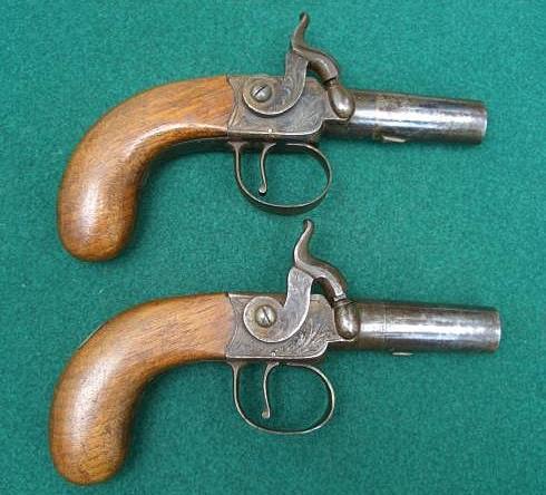 Figure 18 A pair of percussion pocket pistols, c1840, turn-off Birmingham proved barrels signed Pether,