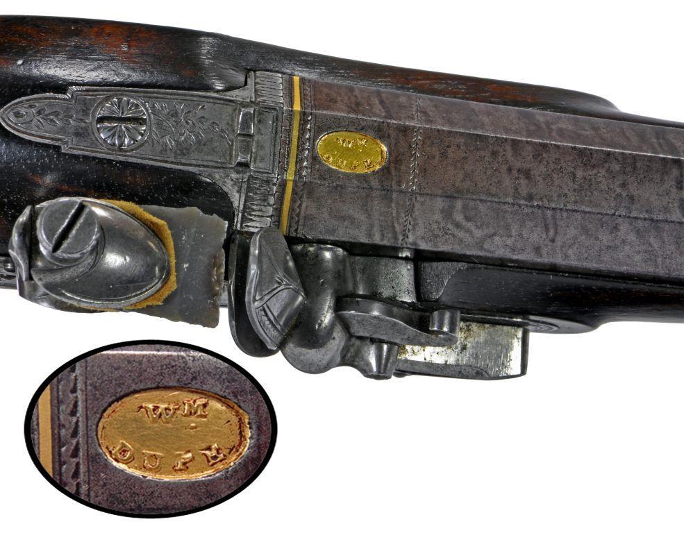 Figures 10 & 11 A flintlock duelling pistol, c1810, with octagonal Damascus twist barrel signed Wm Dupe in an oval gold cartouche, engraved bolted lock