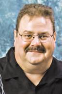 Track announcer and television host Roger Huston is a member of seven Halls of Fame, including harness racing s Communicators Corner.
