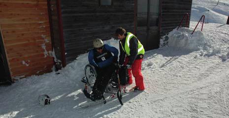 1 transfer To transfer a skier from a sitting position into their equipment, ask them first what works best.