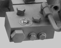 MANIFOLD INSPECTION AND MAINTENANCE Restrictor core The restrictor core should be inspected at all normal service periods, or when control pressure begins to deteriorate, for dirt build up on the