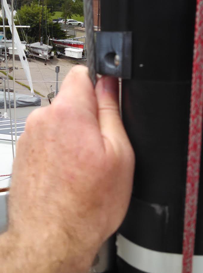Adjust the Upper Shroud lengths until the mast is centered and the halyard to shear lengths are the same from side-to-side.