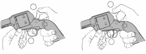3. Grasp the revolver (if right handed) so that the thumb and forefinger of your left hand are firmly holding the frame, forward of the trigger guard.