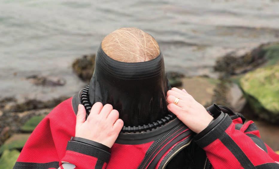 3. Donning When donning a drysuit with a Quick Neck System mounted it is of great importance